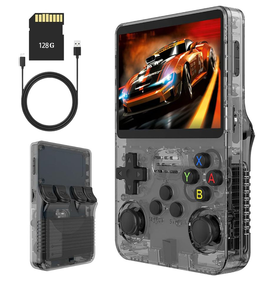 Handheld gaming console with transparent casing, controller, 128GB microSD card, and USB cable on a white background.